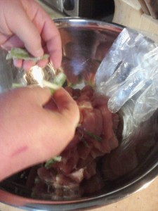 Adding green onions to Korean pork BBQ