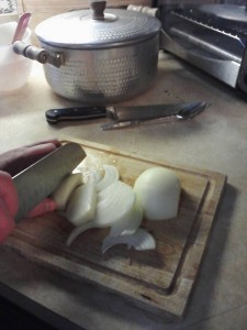 Cut onion lengthwise, then separate pieces.