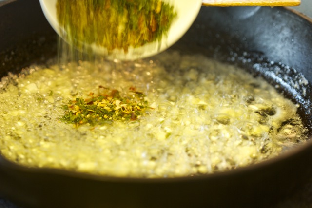 Adding the herb mixture