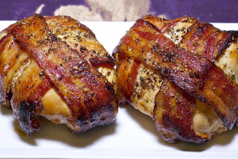 Grilled bacon-wrapped stuffed chicken breasts