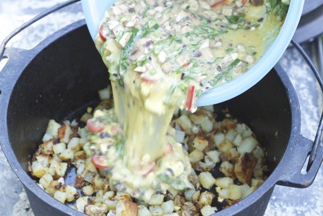 Adding Frittata mixture to potatoes | Cooking-Outdoors.com | Gary House