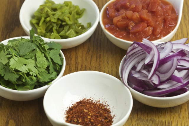 Diced tomato, sliced red onion, southwestern seasonings, cilantro and roasted Anaheim chili | Cooking-Outdoors.com | Gary House