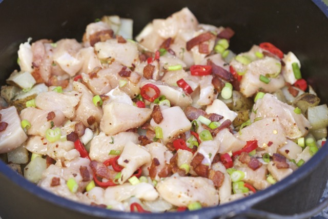 Chicken, green onions, red anaheim chili peppers and seasoning added to Idaho potatoes | Cooking-Outdoors.com | Gary House