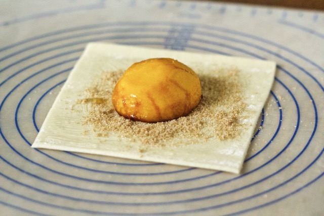 Grilled peach placed on pie dough | Cooking-Outdoors.com | Gary House