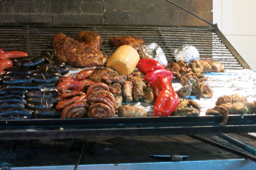Sausages, vegetables and offal on the grill | Authentic Food Quest 